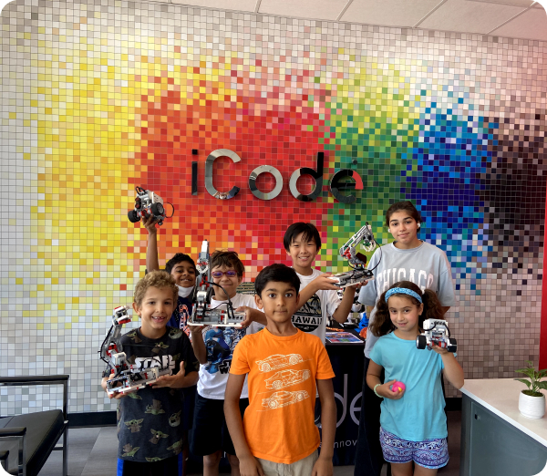 kids standing in front of an iCode sign
